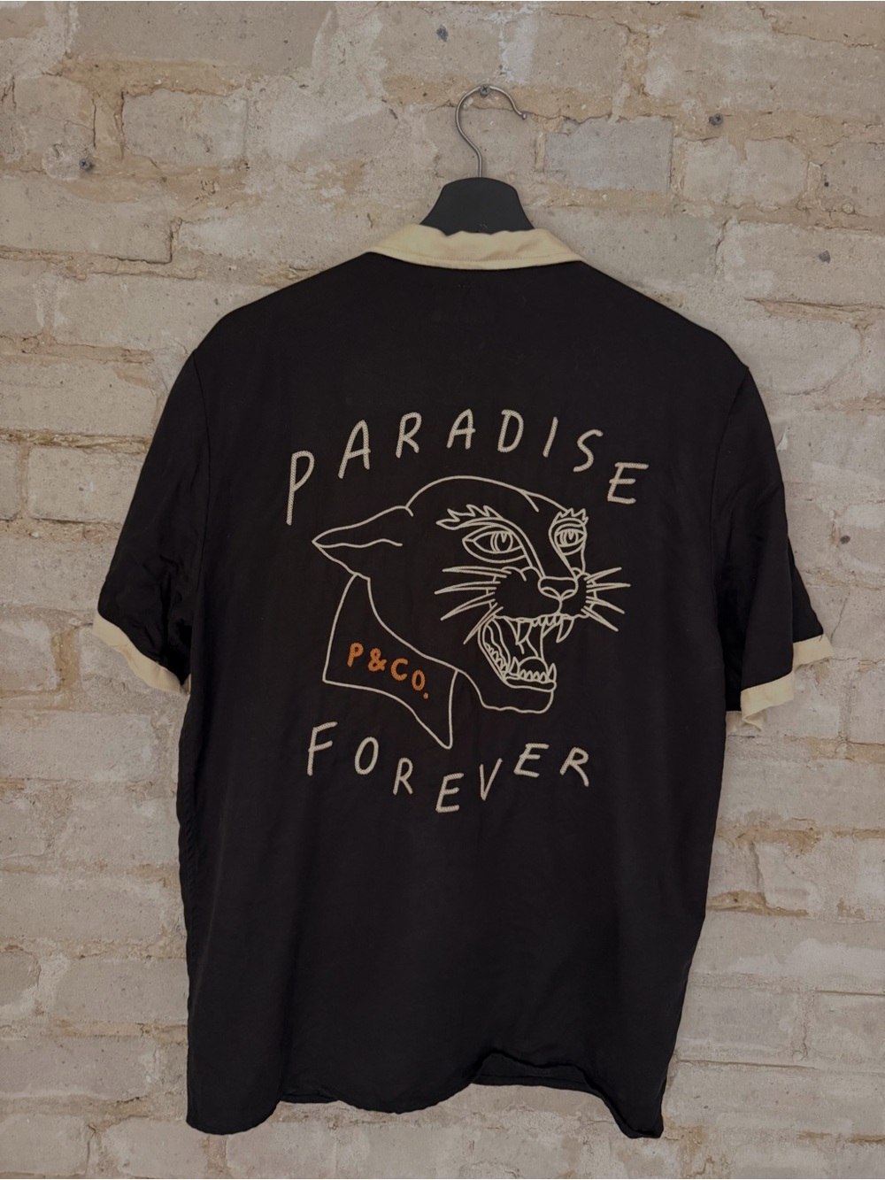P&Co. Black Short Sleeve Polo with Cream Trim and Panther Graphic (unisex)